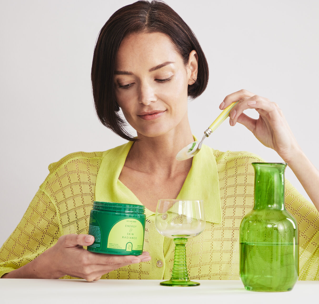 INTU WELLNESS model taking super powder